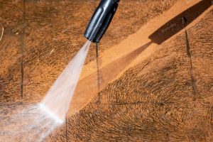 Cleaning backyard paving tiles with pressure washer. Spring clean up Stock Photo, ft. backyard & cleaner - Envato