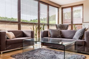 Grey interior with big windows and sofas Stock Photo, ft. apartment & coffee table - Envato