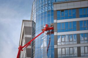 Professional Maid Cleaning And Wiping Window In Office With Soap Stock Photo, ft. 40s & active - Envato
